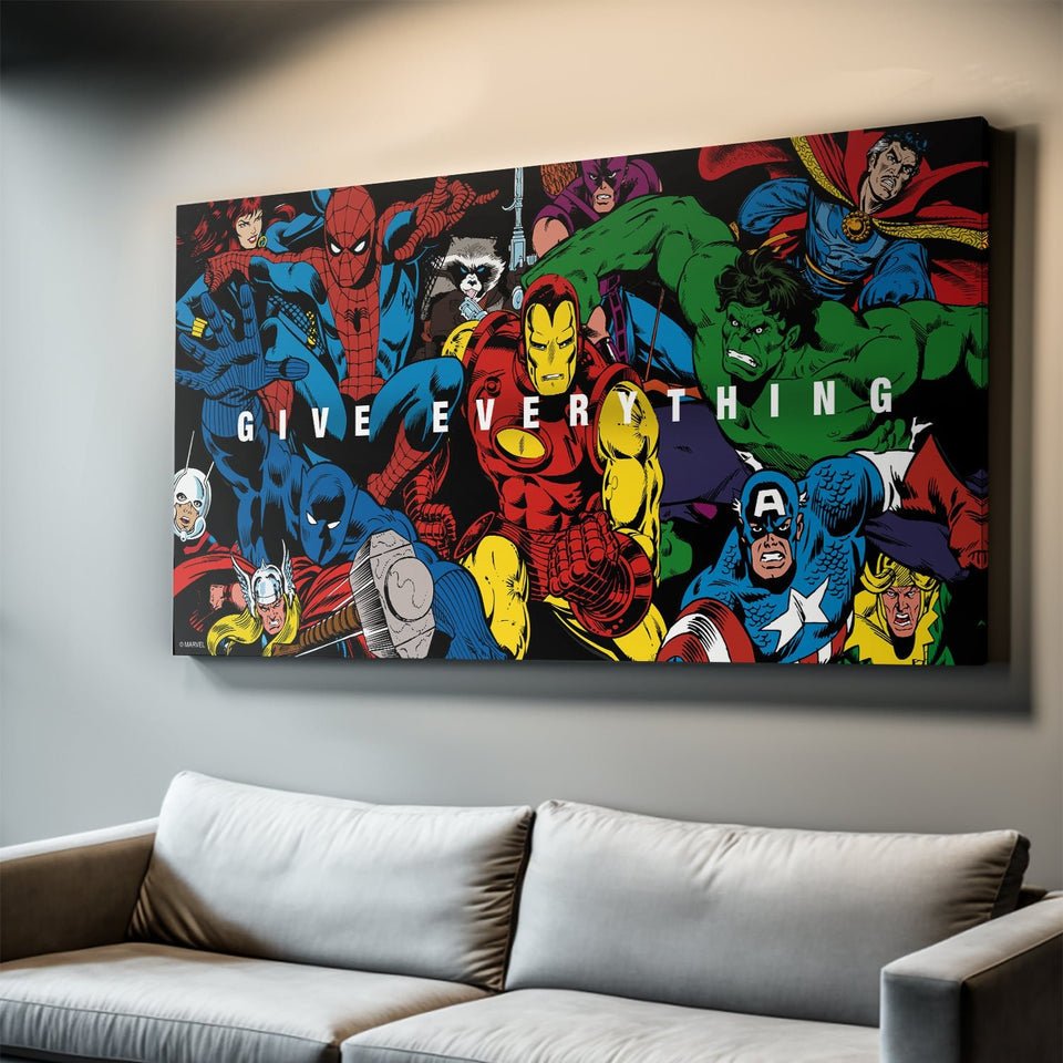 Colorful Marvel superhero canvas wall art with 'Give Everything' quote above a modern sofa.